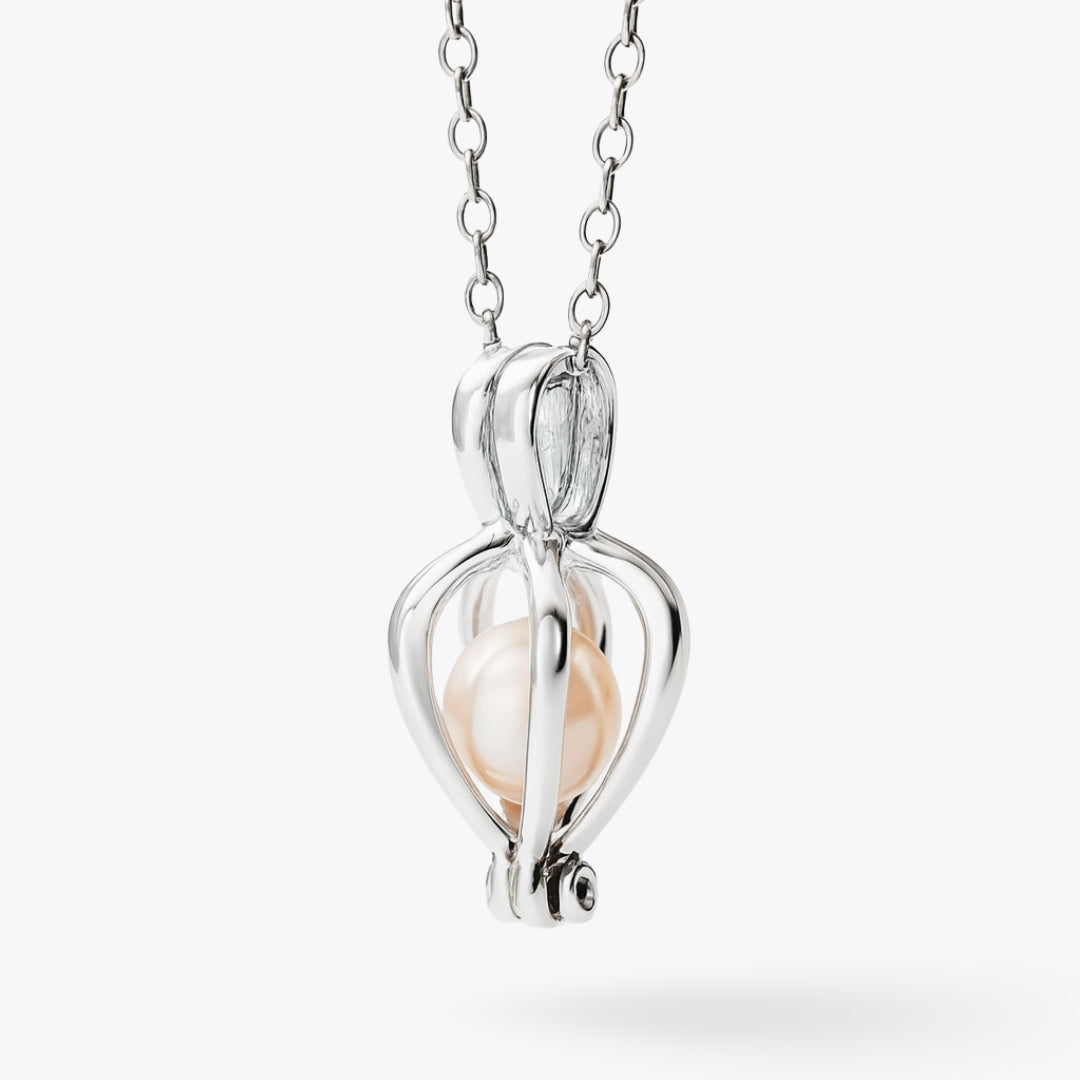 Silver necklace with a pendant featuring a pearl on a white background