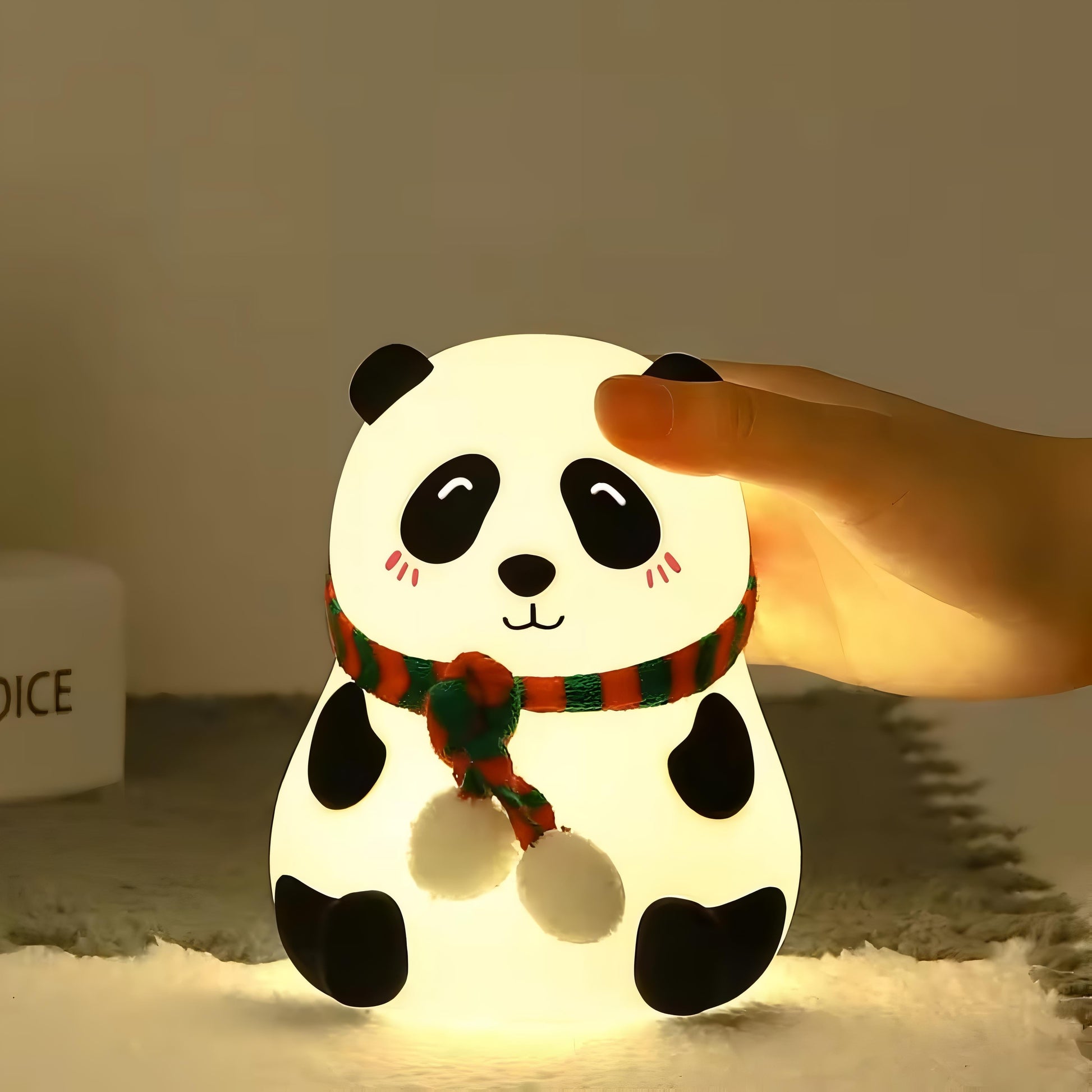 Soft silicone panda night light being gently squeezed – perfect for kids and cozy spaces